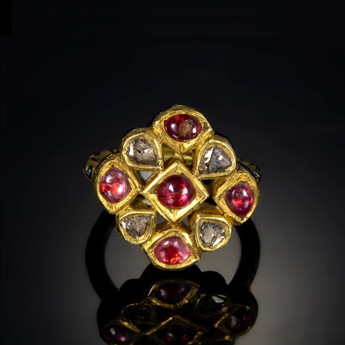 A 20th century Indian gold and enamel ring with foiled diamonds & rubies.